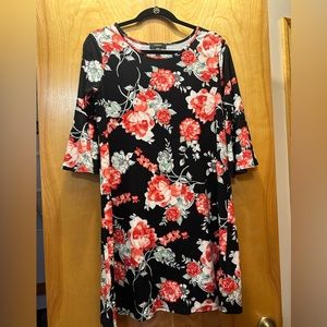 Espresso black floral dress with bell sleeves.